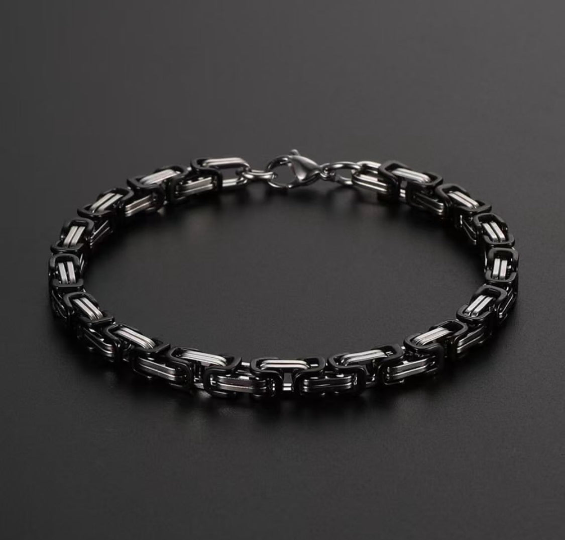 Silver and black bracelets