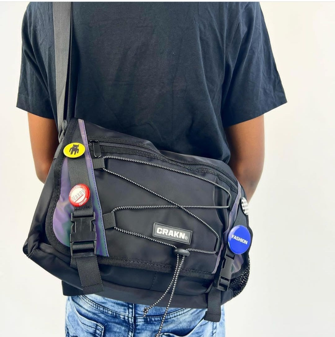 CRAKN, cross body bag with button.