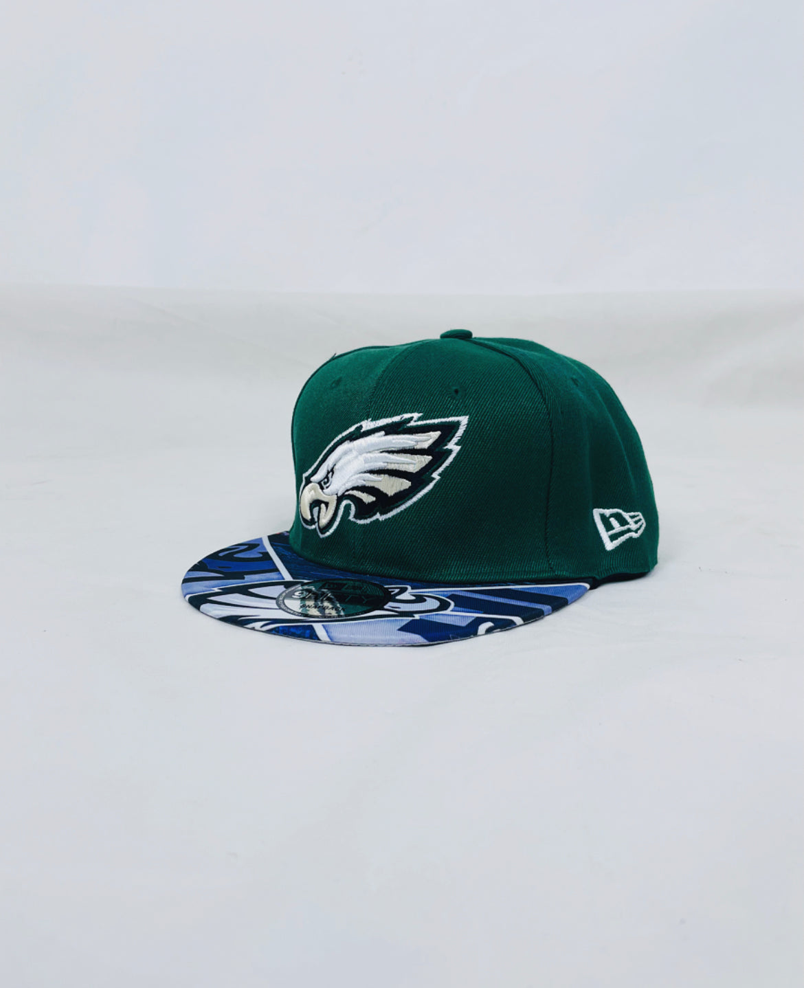 Eagles cap with green background
