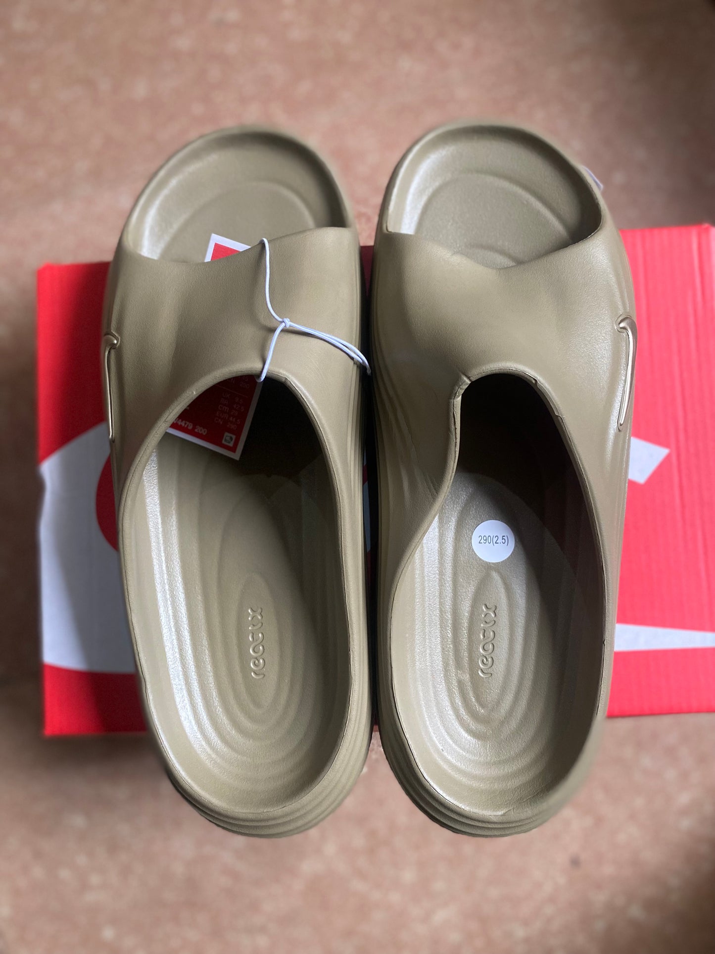 Nike rubber slide in brown