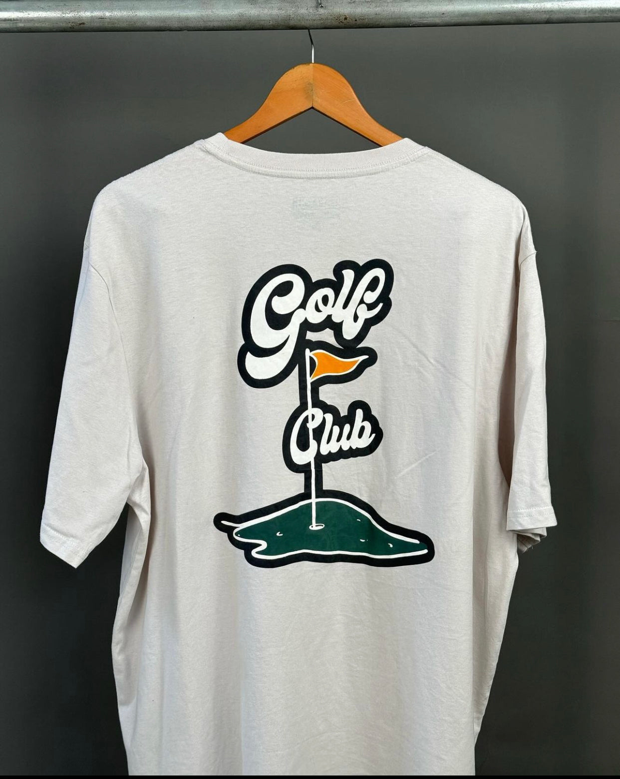 Garage golf club tee