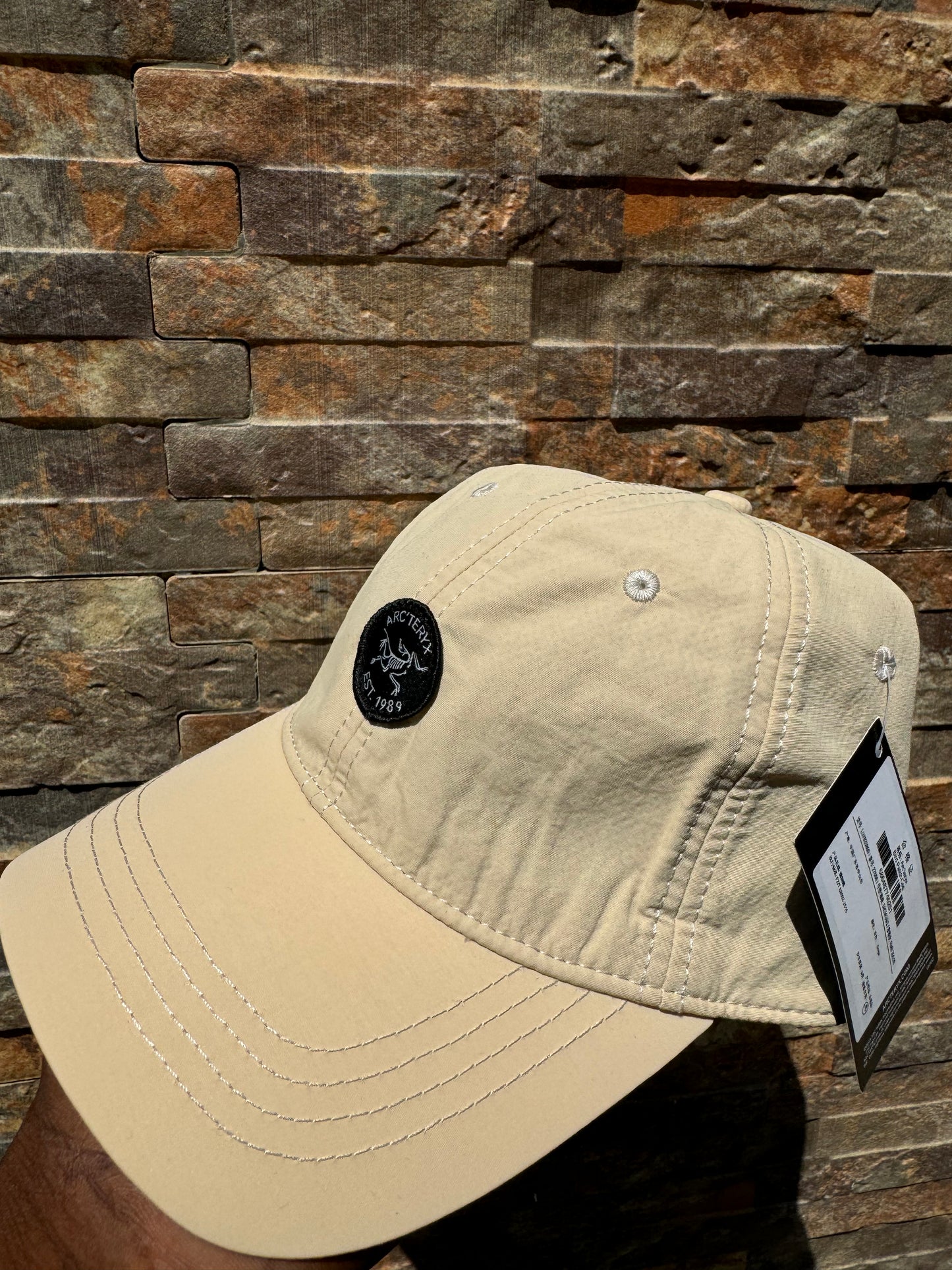 Arcteryx hat cream