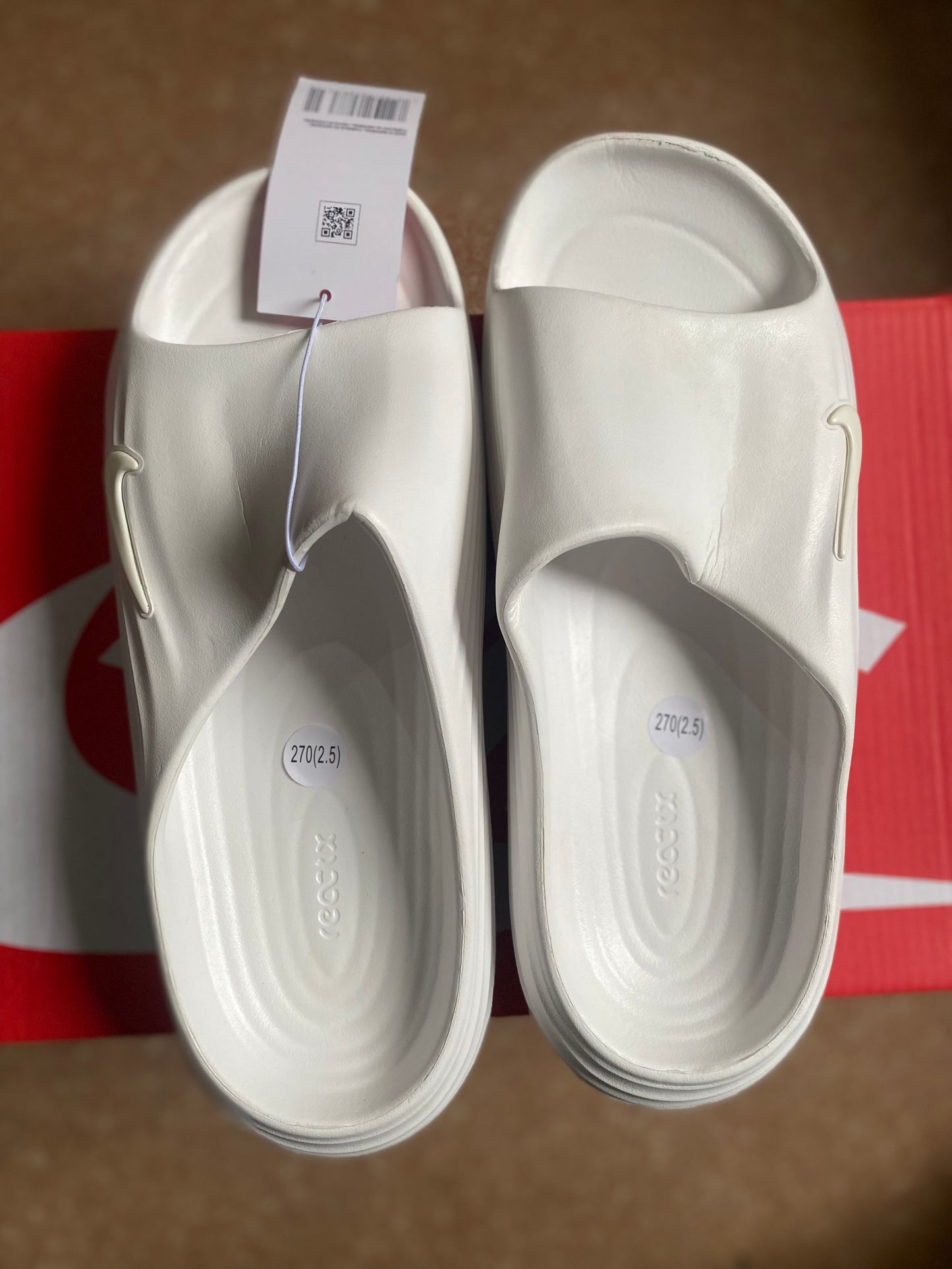 Nike rubber slide in white