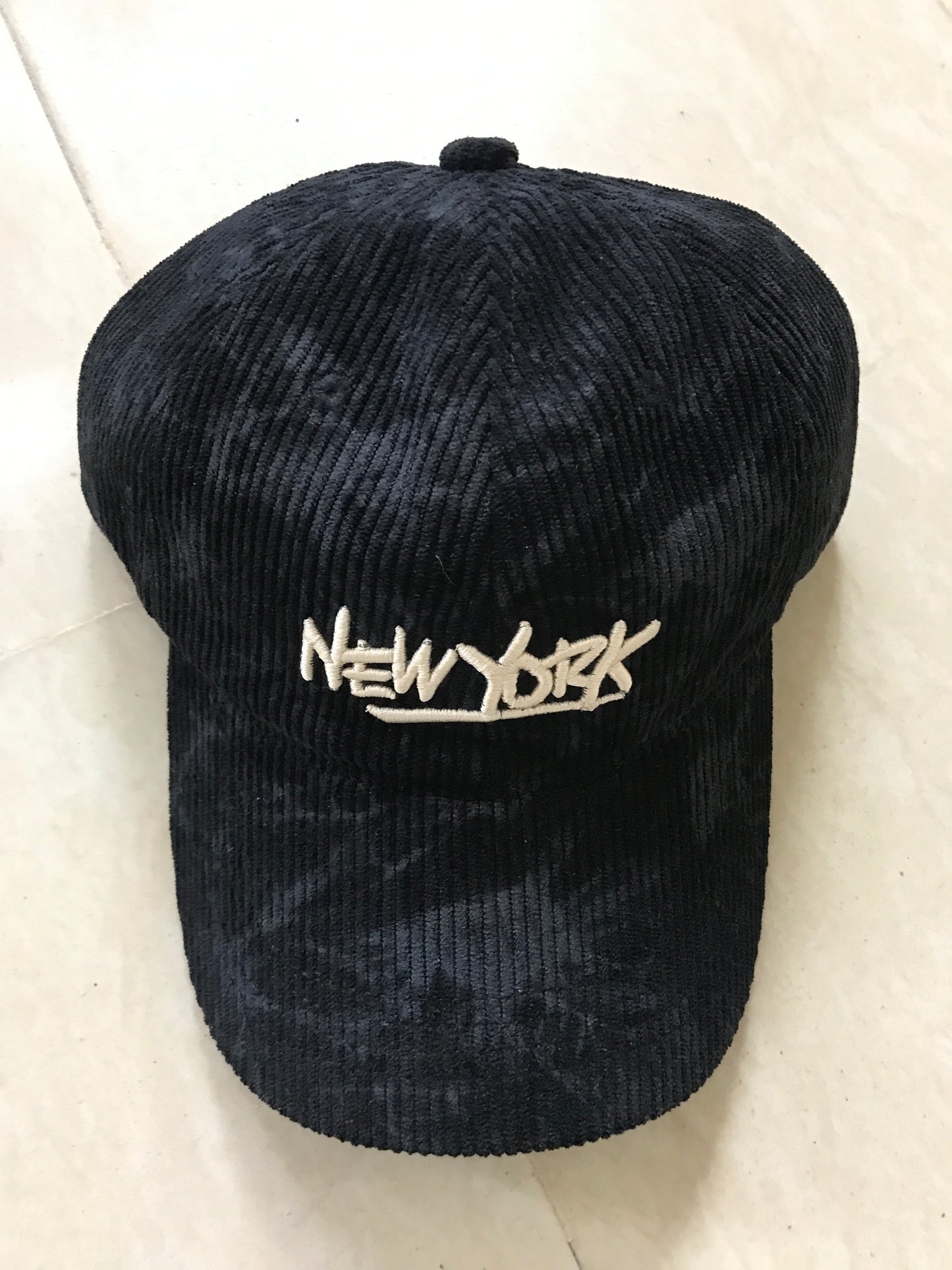 NEW YORK CORDUROY ACID WASH HAT IN BLACK