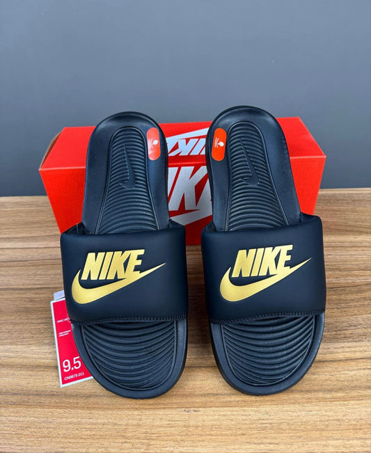 Nike victori one slider in black and gold