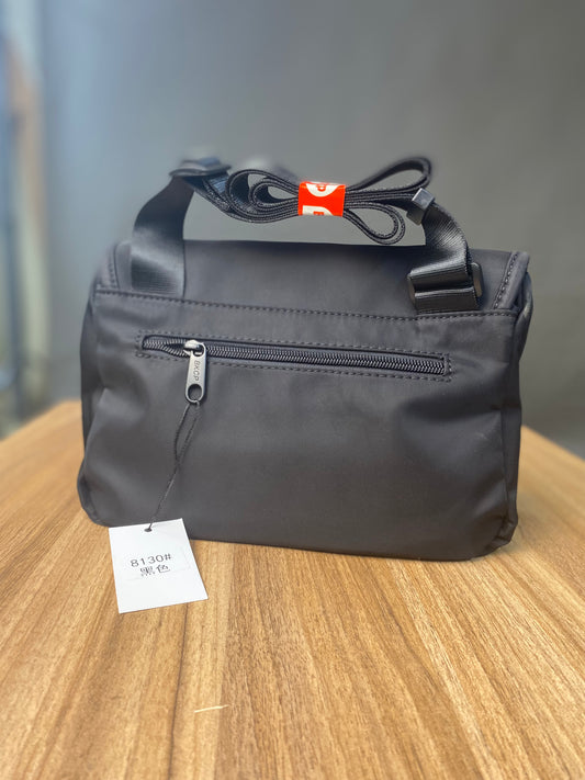 Bkcp cross body bag in both colours. In black