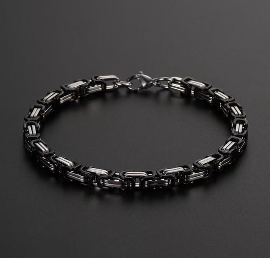 Silver and black bracelets