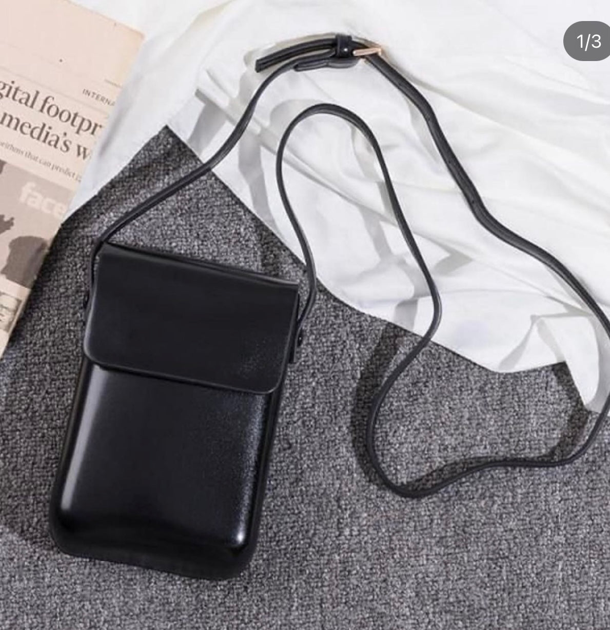 Minimalist flap crossbody bag in black