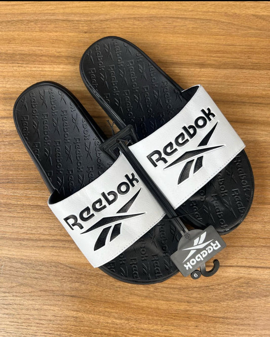 Reebok slides in white /black