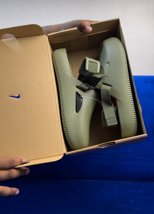 Nike clogs in camo green