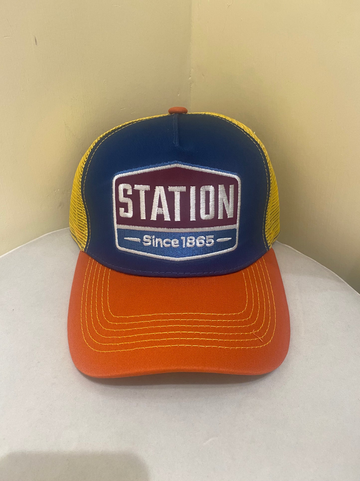 STATION TRUCKER HAT IN ORANGE
