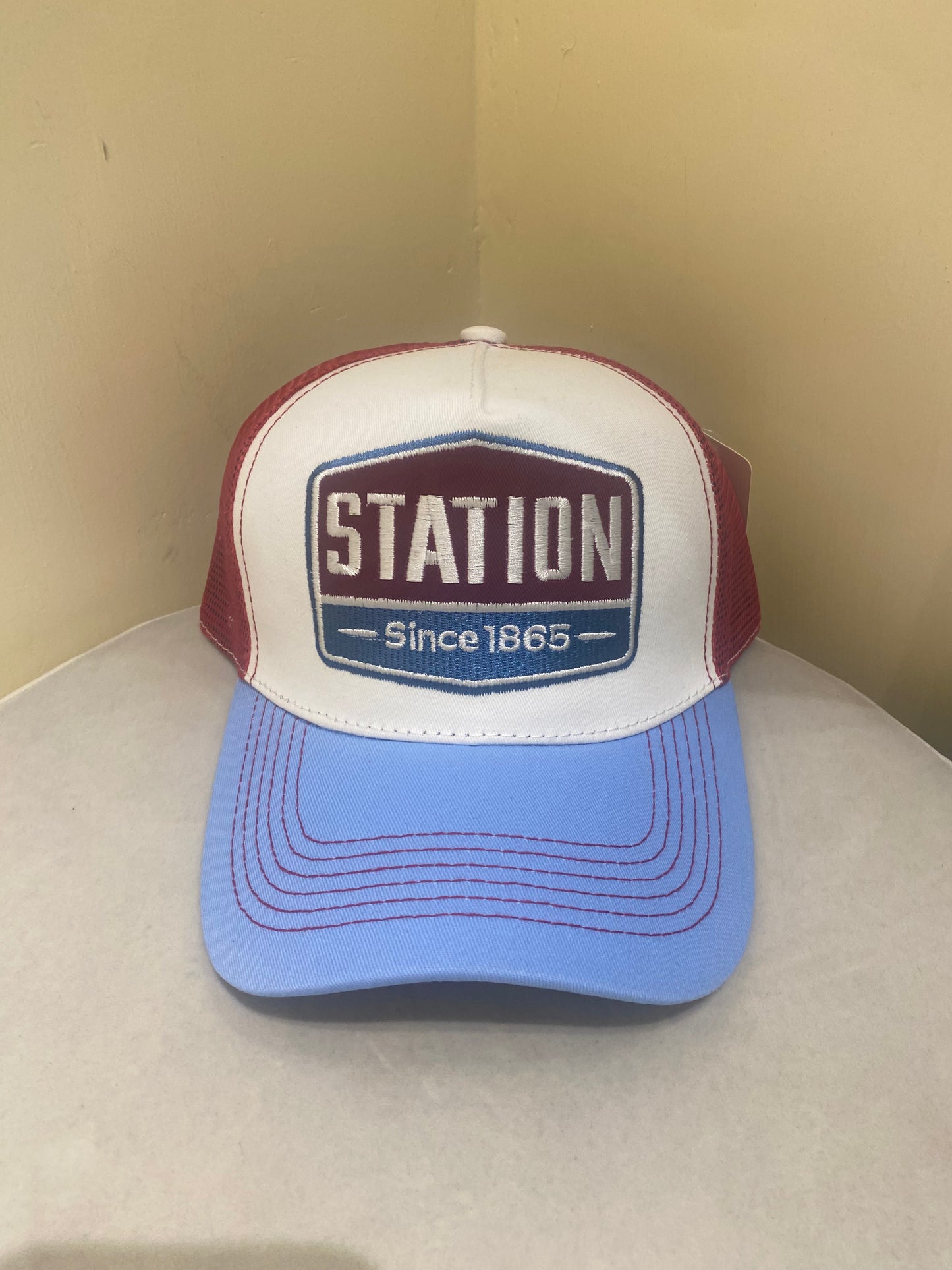 STATION TRUCKER HAT IN RED AND BLUE