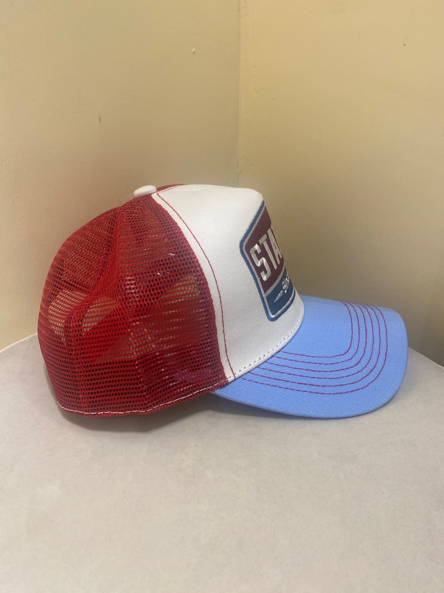 STATION TRUCKER HAT IN RED AND BLUE