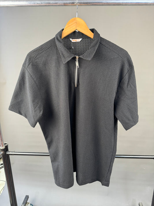 Twenty knitted polo shirts in black