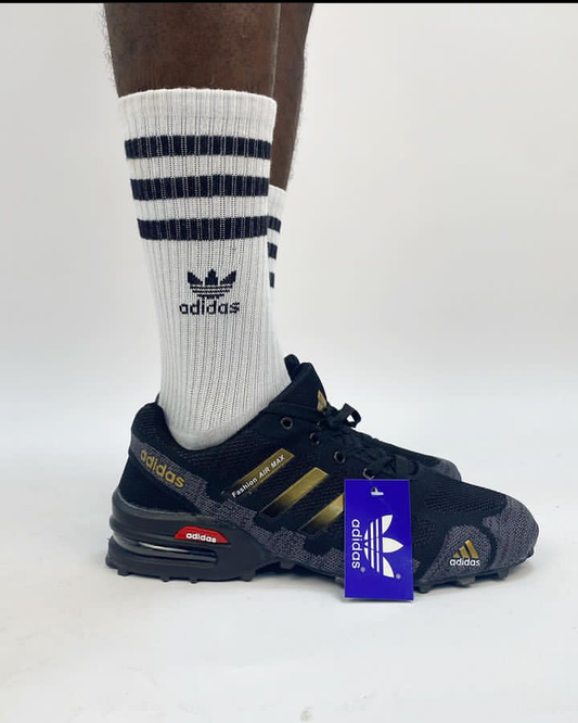 Adidas sport black shoes with  gold touch
