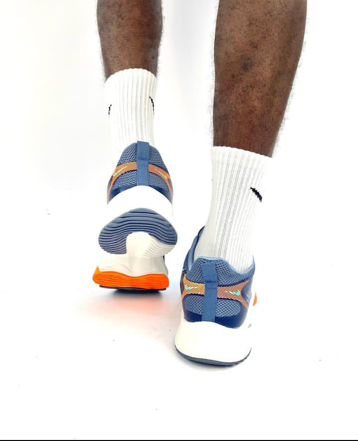 Nike grey and orange shoe
