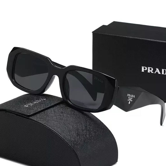 Prada Rectangle lens geometric frame glasses in black